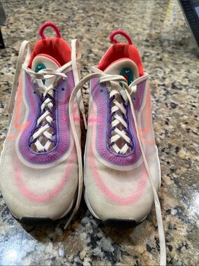 Nike Beige Sneakers with Pink, Purple & Coral Accents